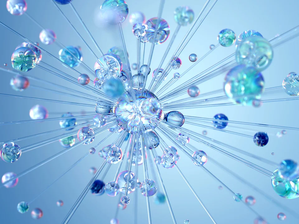 Abstrakte 3D-Visualisierung mit transparenter Kugel im Zentrum, von der feine Linien strahlenförmig ausgehen; darum schweben schillernde, glasartige Blasen in Blau- und Türkistönen vor hellem Hintergrund.